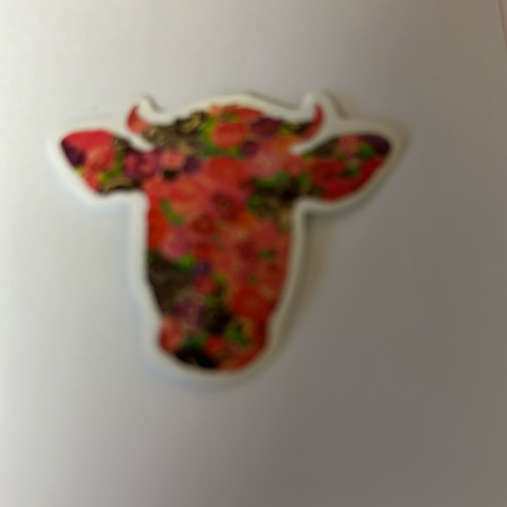Cow sticker‎
